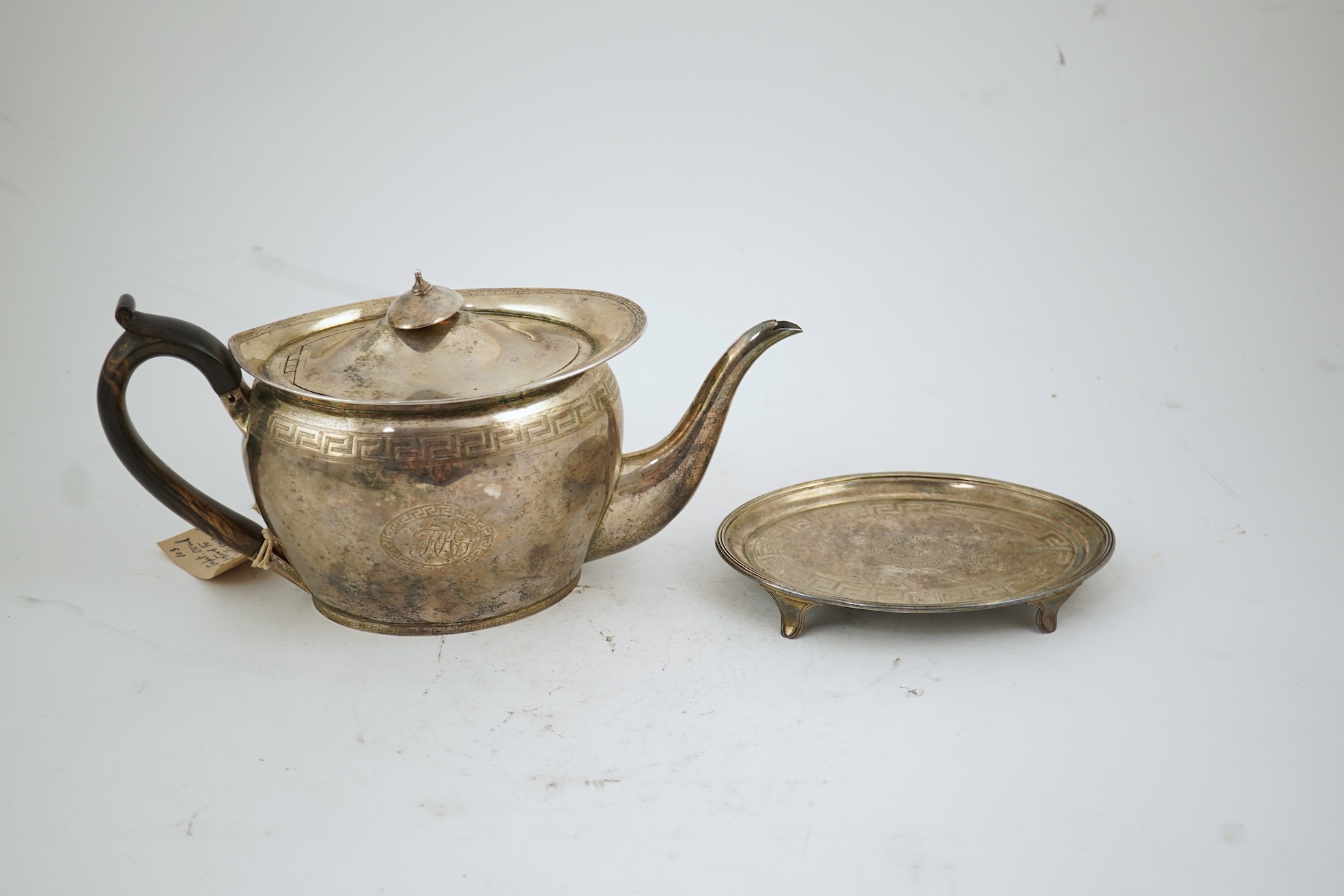 A George III silver oval teapot and matching oval stand, by John Eames